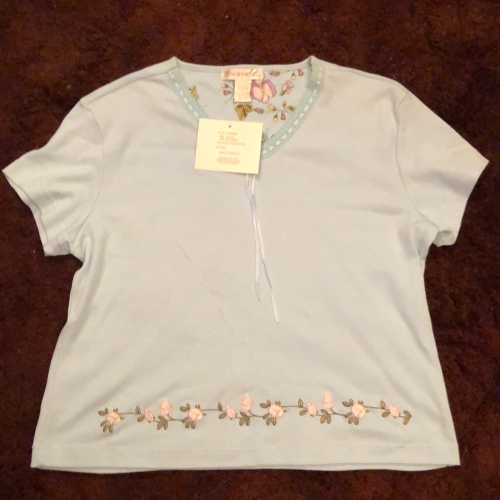 Large light blue T-shirt never worn